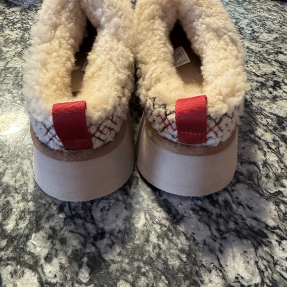 UGG Tazz Braid slippers in the "Heritage Braid Natural" colorway. - Picture 2 of 3